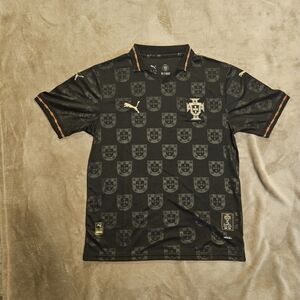 Puma Men’s Black Football Jersey with Gold Accents